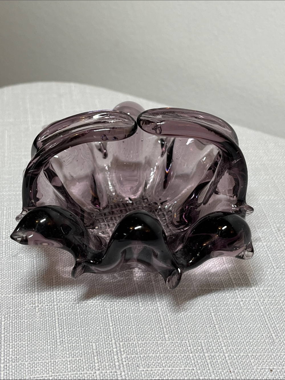Vintage Amethyst art glass bowl chalet piece
decor or a trinket dish